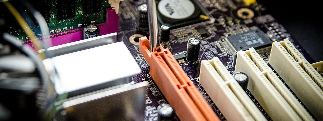 Mainboard section showing expansion card slots displayed at a Sarasota technology company.