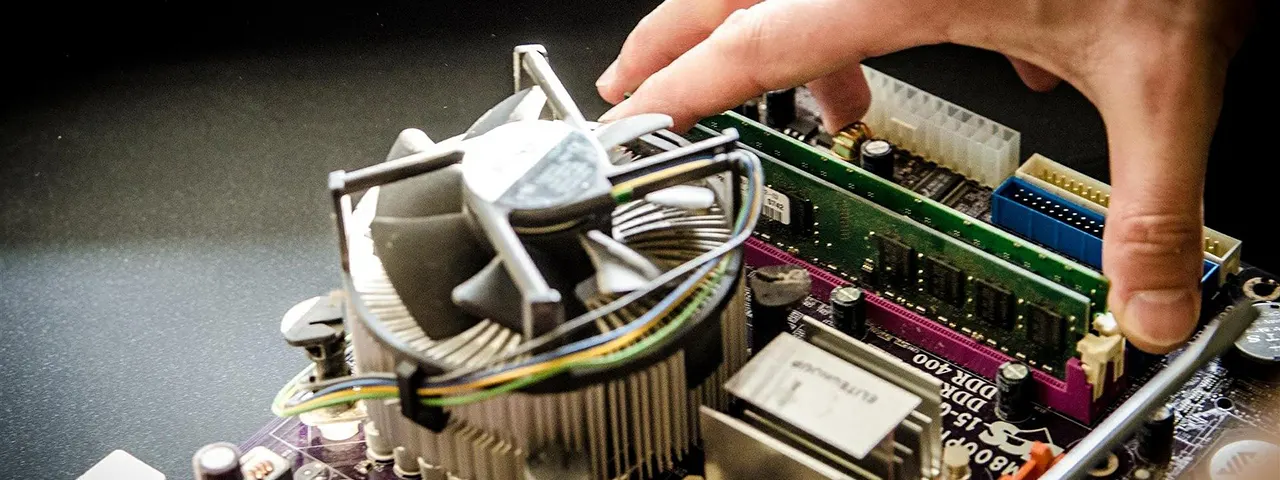 Technician removing member for a computer repair service request in Sarasota, Florida.