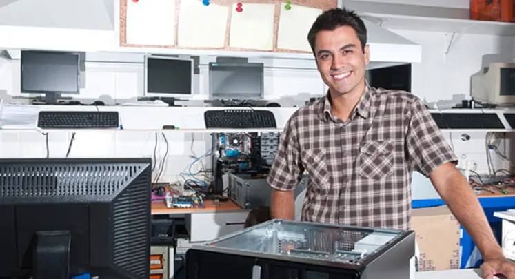 Computer Networking technician in a business office.