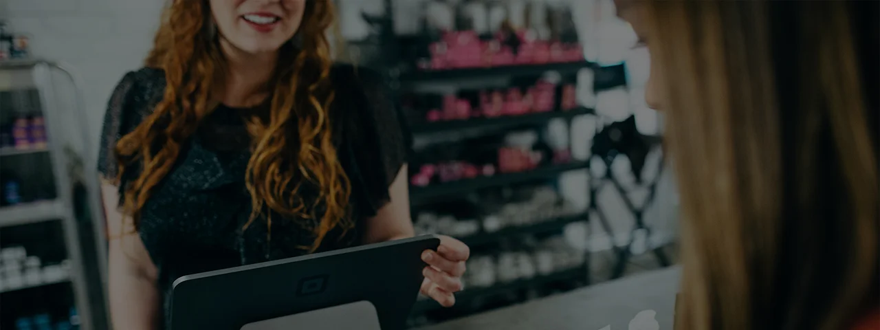 Client testing her computer after the managed IT service provider repairs it.